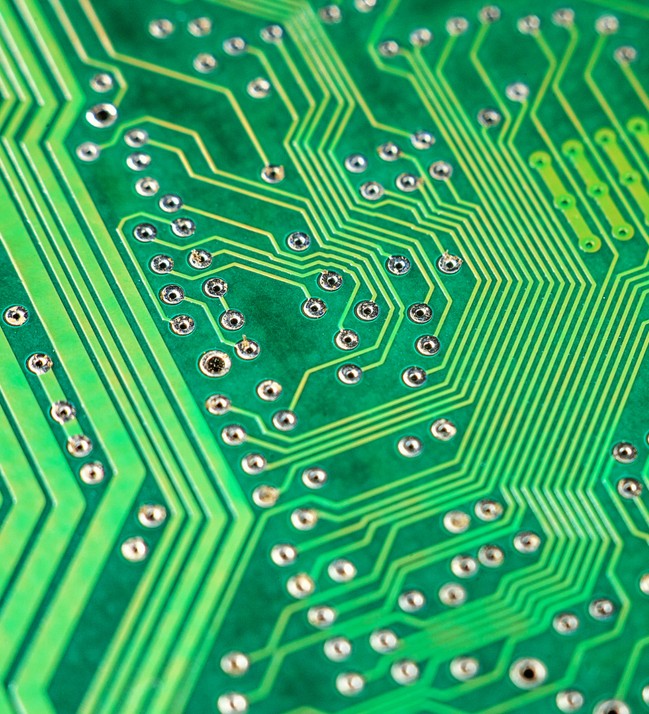 Electronic components close-up on a green PCB